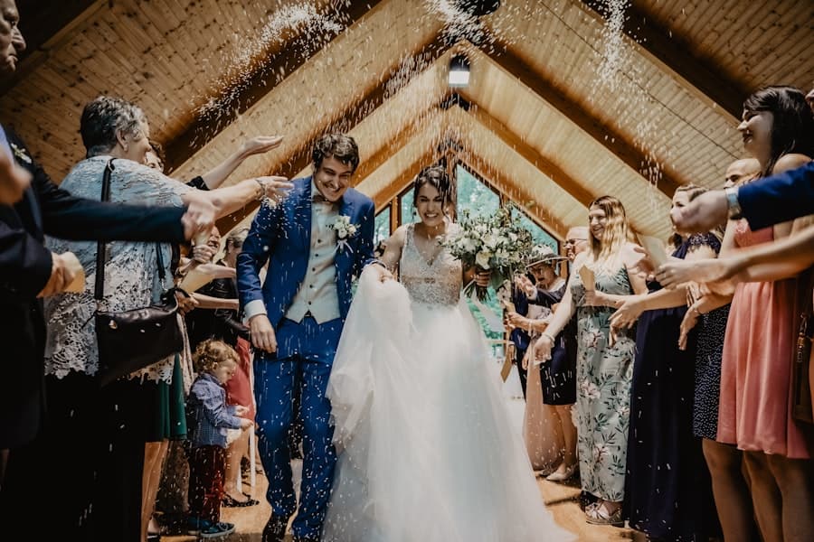 Confetti thrown over the couple as they walk out
